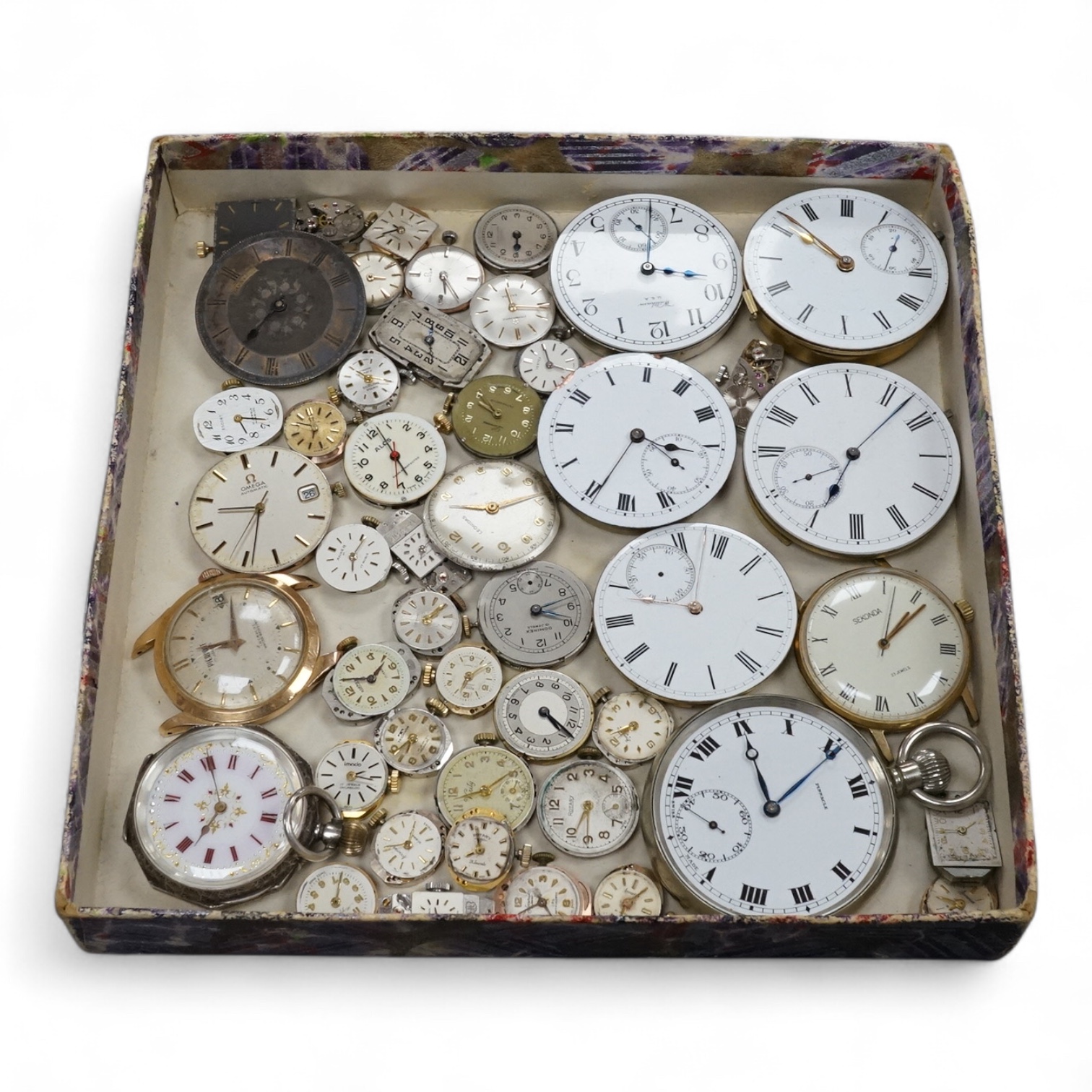 A quantity of assorted wrist and pocket watch movements, including Omega and Omega automatic, together with a pocket watch and a 935 white metal fob watch.